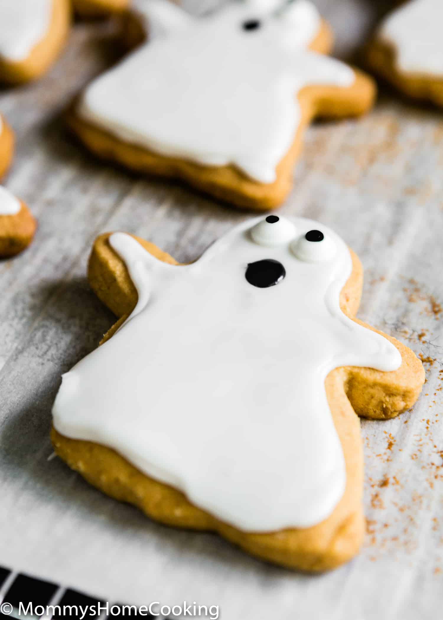 halloween ghosts peanut butter cookie over a cookie sheet