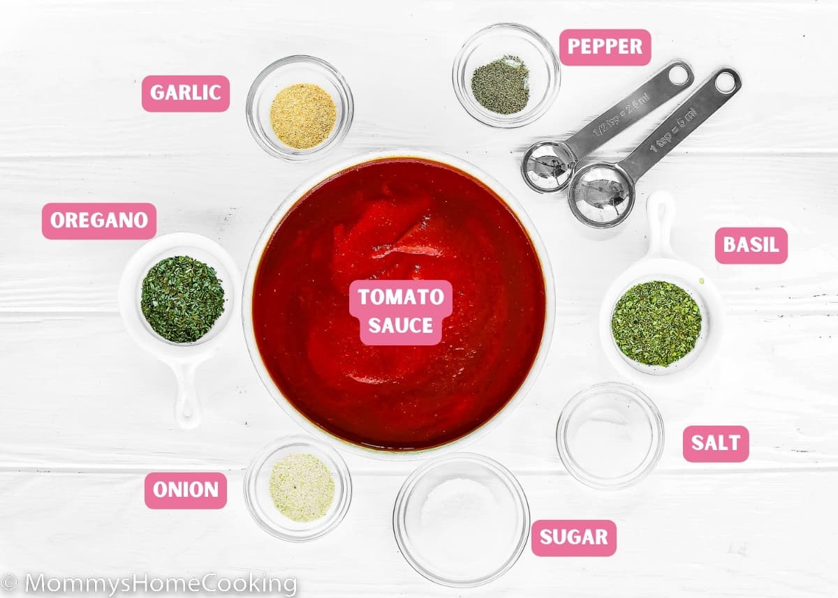 Ingredients needed to make homemade pizza sauce with name tags. 
