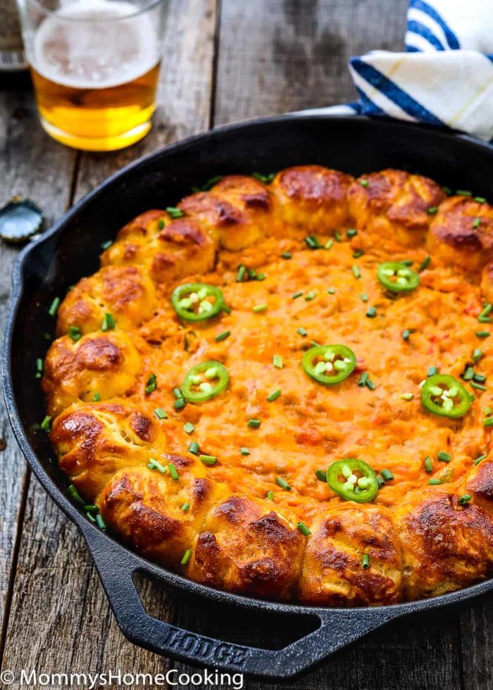 This Cheesy Taco Dip with Garlic Pretzels Dippers is just what the party or game day calls for. It’s cheesy, meaty, creamy, and extremely easy to make. This delicious dip is guaranteed to be a hit with your crowd. https://mommyshomecooking.com