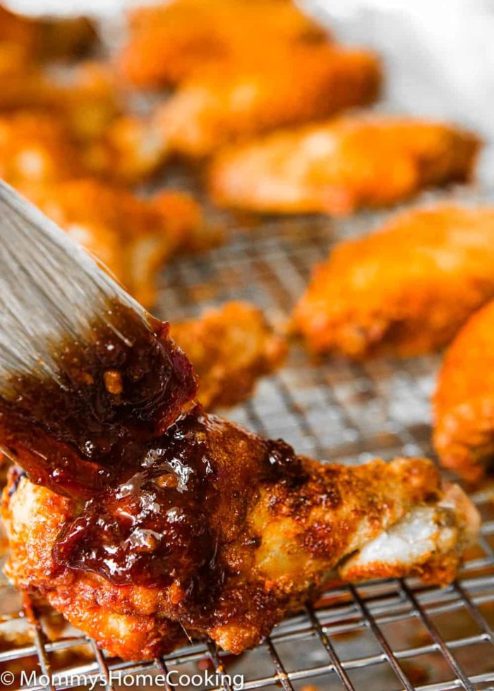 glazing chicken wing with chipotle glaze