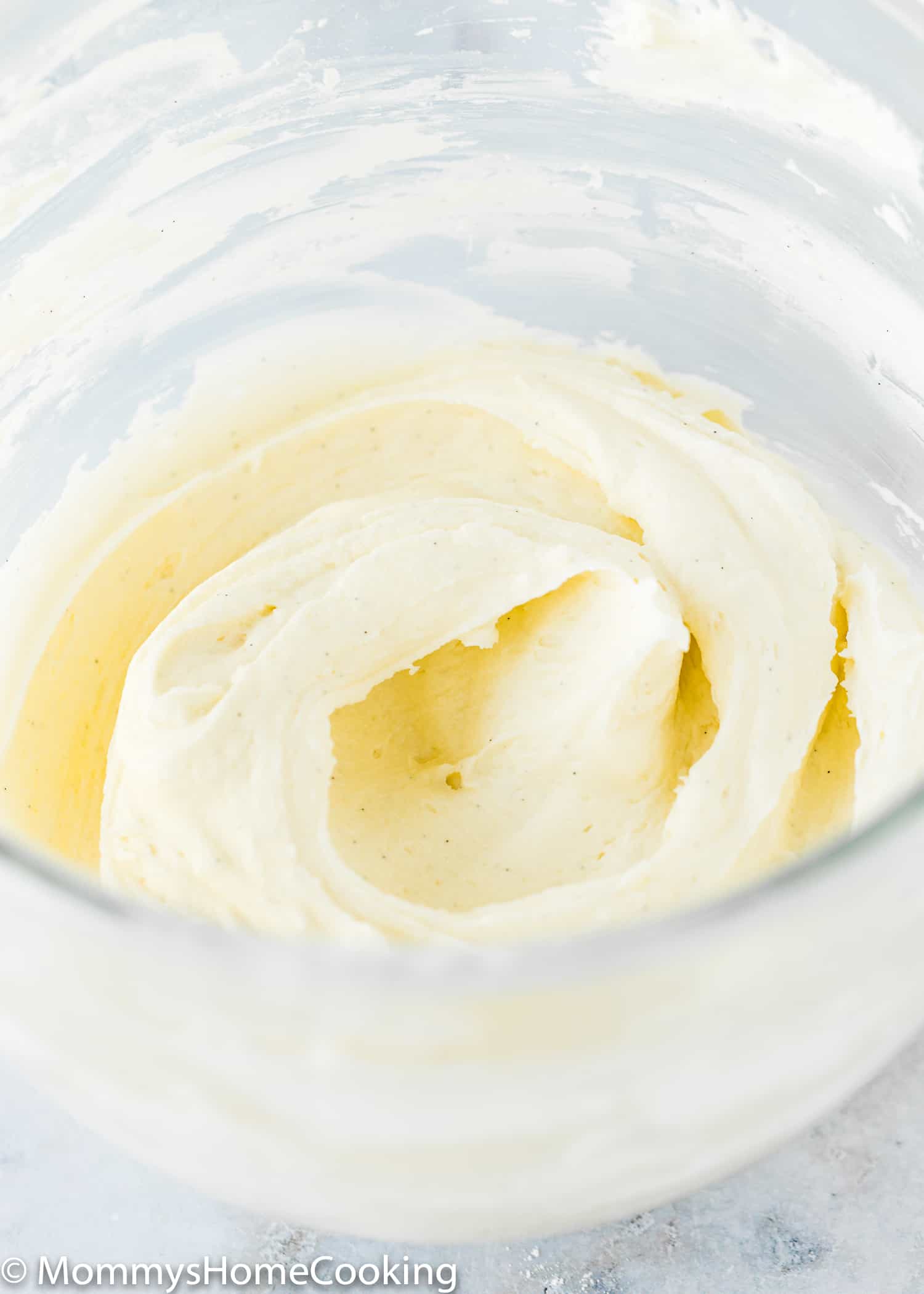Coconut buttercream frosting in a mixing bowl