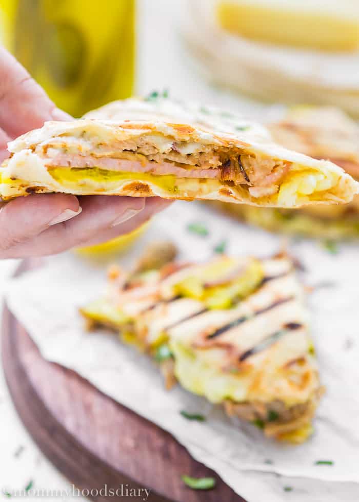 These Cuban Quesadillas are ridiculously easy to make, delicious, and bursting with flavor!  Perfect for an easy, NO-FUSS meal. https://mommyshomecooking.com