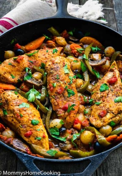Easy Chicken Breasts Cacciatore in a cast iron skillet with veggies