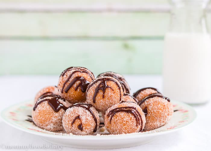 Easy Churro Bites with Chocolate in a plate