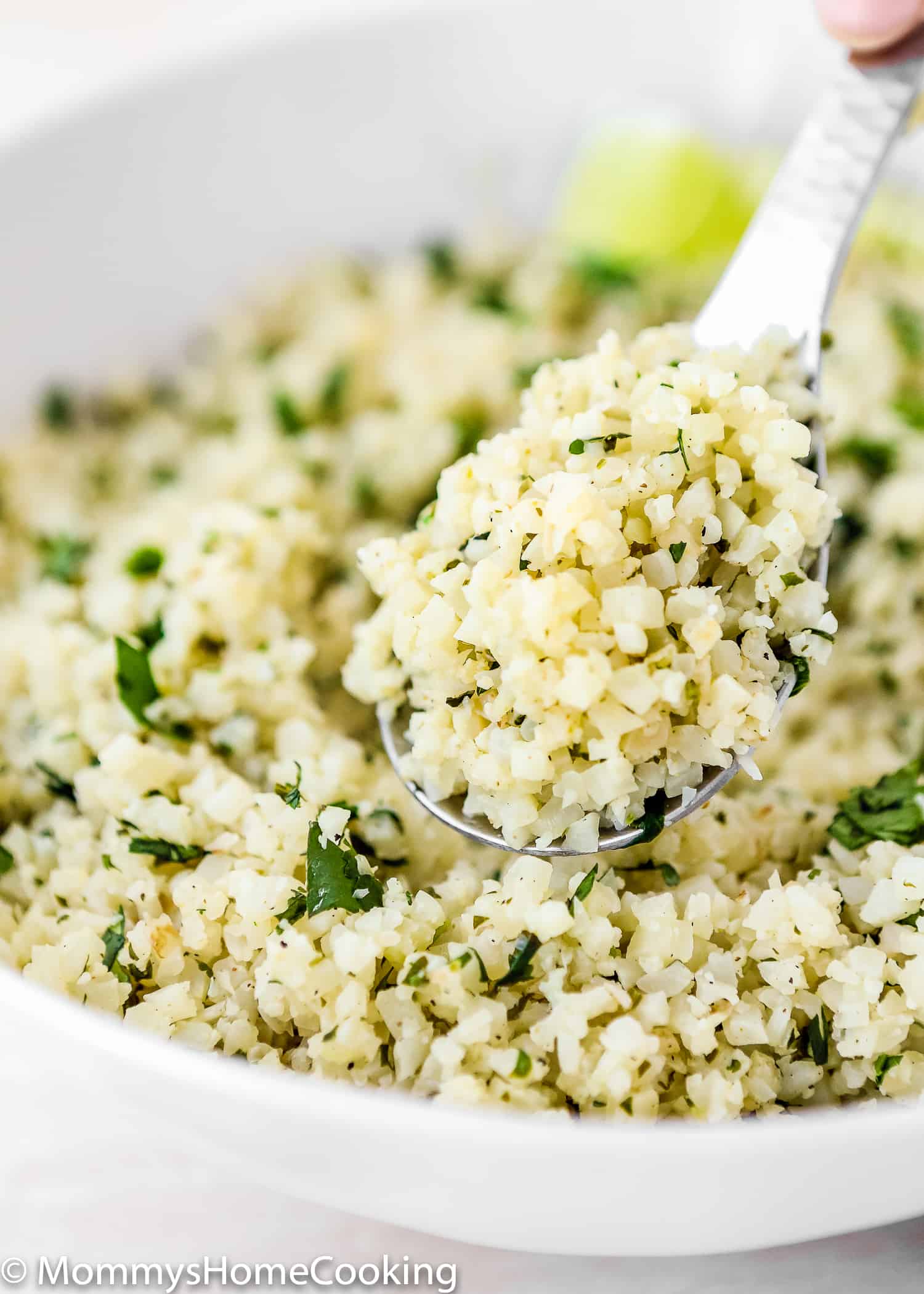 This Easy Cilantro Lime Cauliflower Rice is slightly crispy on the outside, tender on the inside and super flavorful. It’s the perfect side dish to accompany any meal, anytime. Low Carb. Paleo. Keto and Whole 30 friendly. https://mommyshomecooking.com