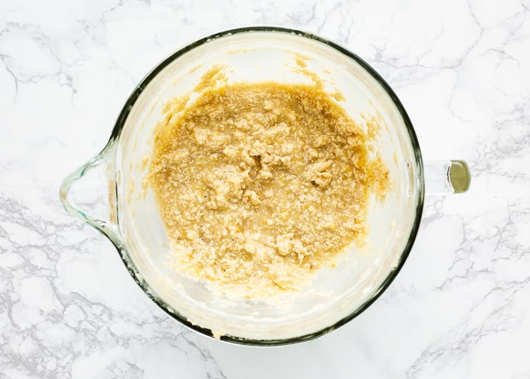 wet Ingredients needed to make eggless banana bread in a mixing bowl. 