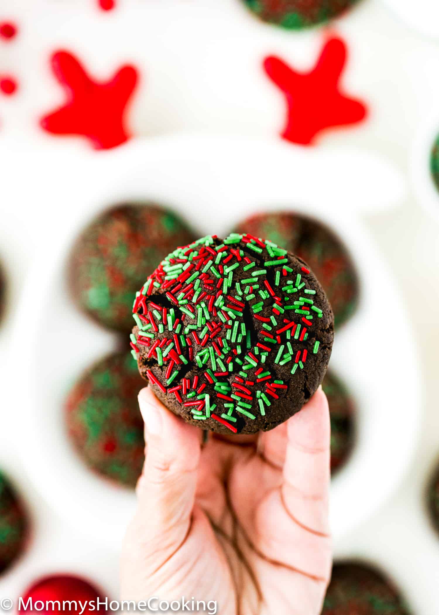 hand holding a  Easy Eggless Cake Mix Christmas Cookie