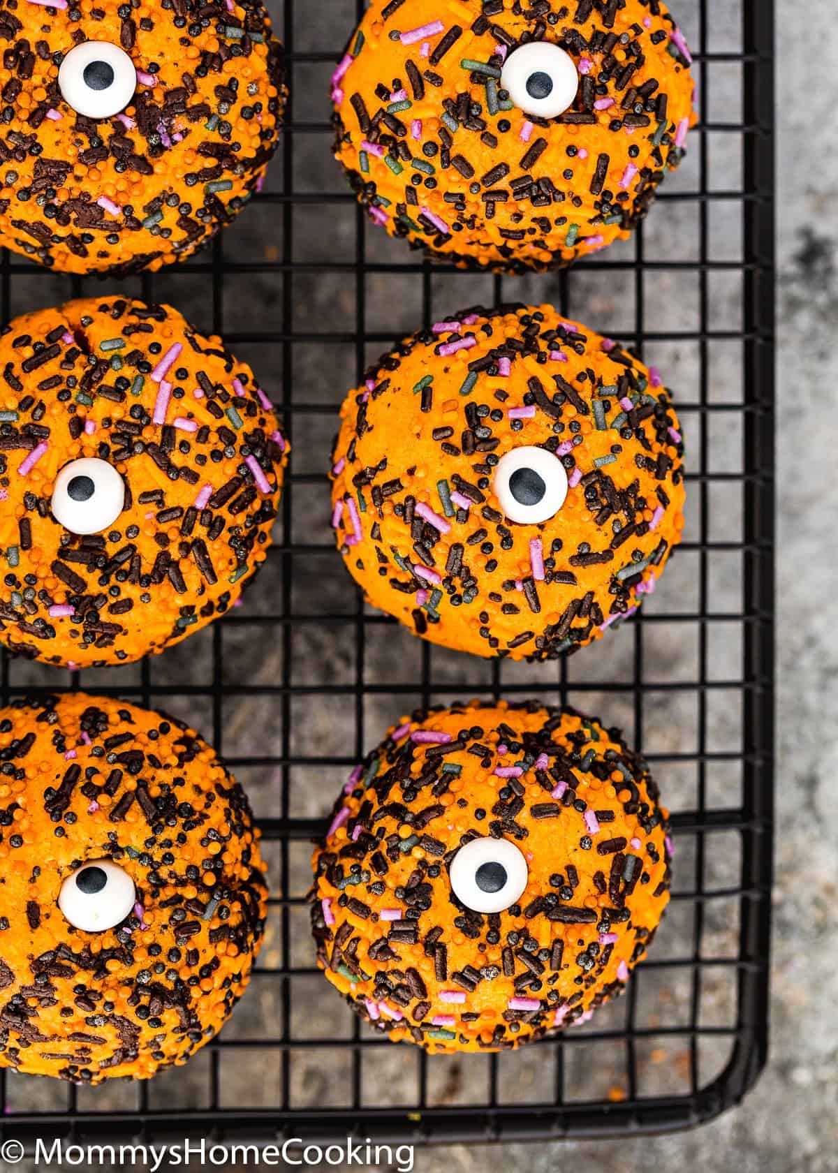 Eggless Halloween Cookies over a cooling rack.