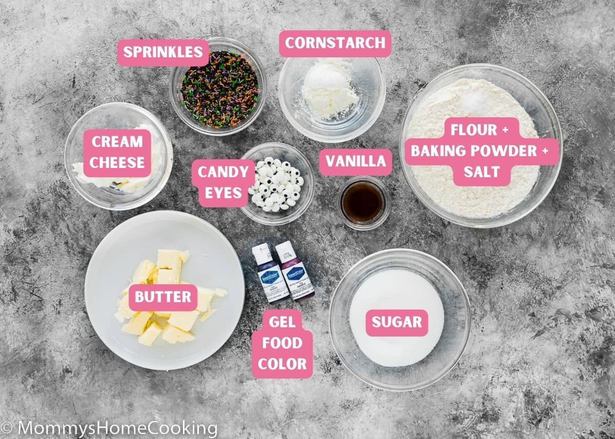 egg-free halloween cookies ingredients over a gray surface with name tags.