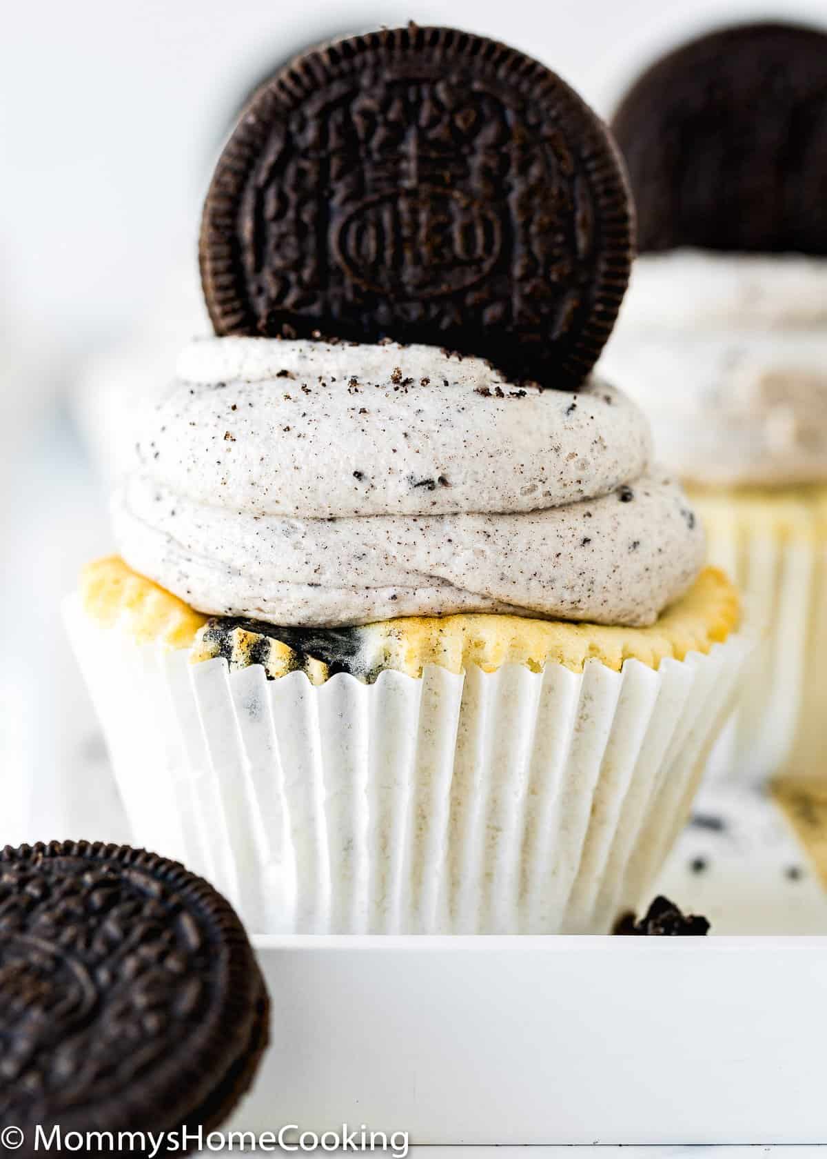 an egg-free oreo cupcakes, frosted with oreo buttercream, and topped with a oreo cookies. 