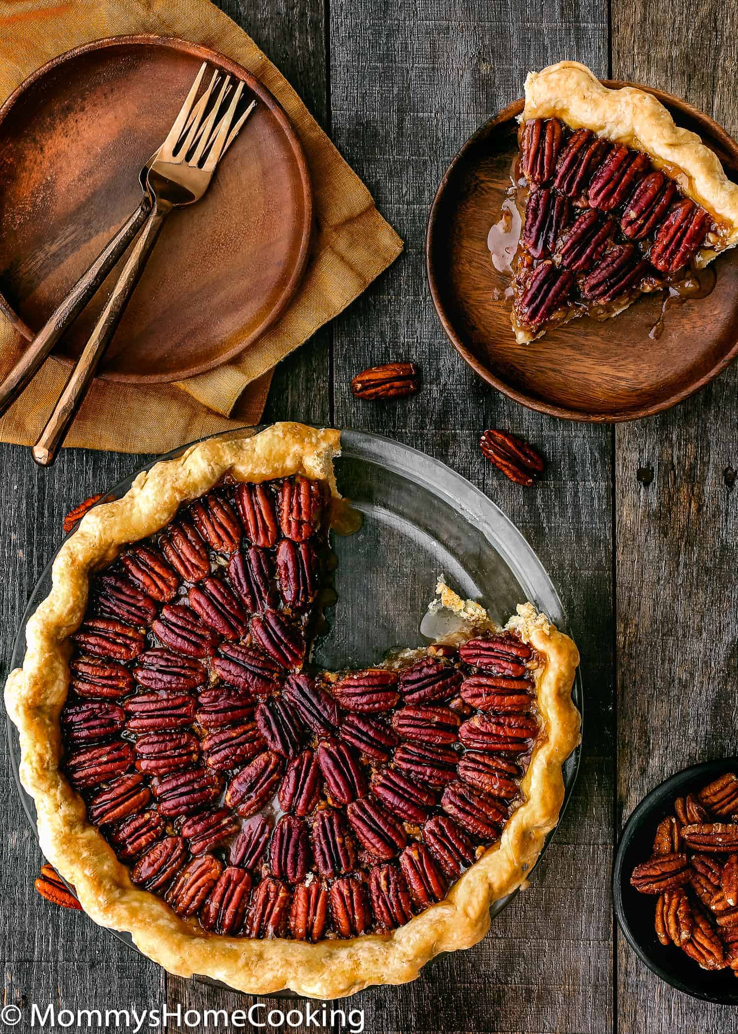 whole Easy Eggless Pecan Pie over a table.
