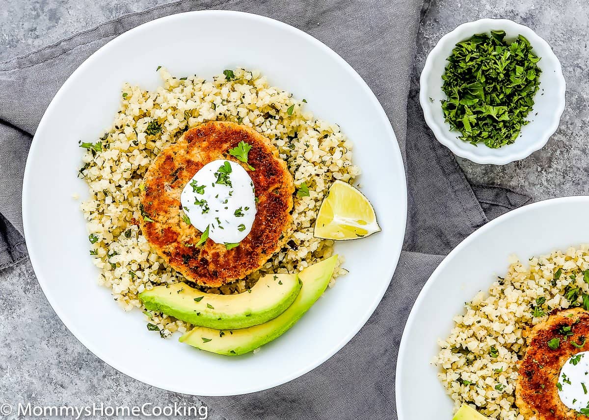 overhead view of Plate with Eggless Salmon Patties, Cauliflower rice and avocado.