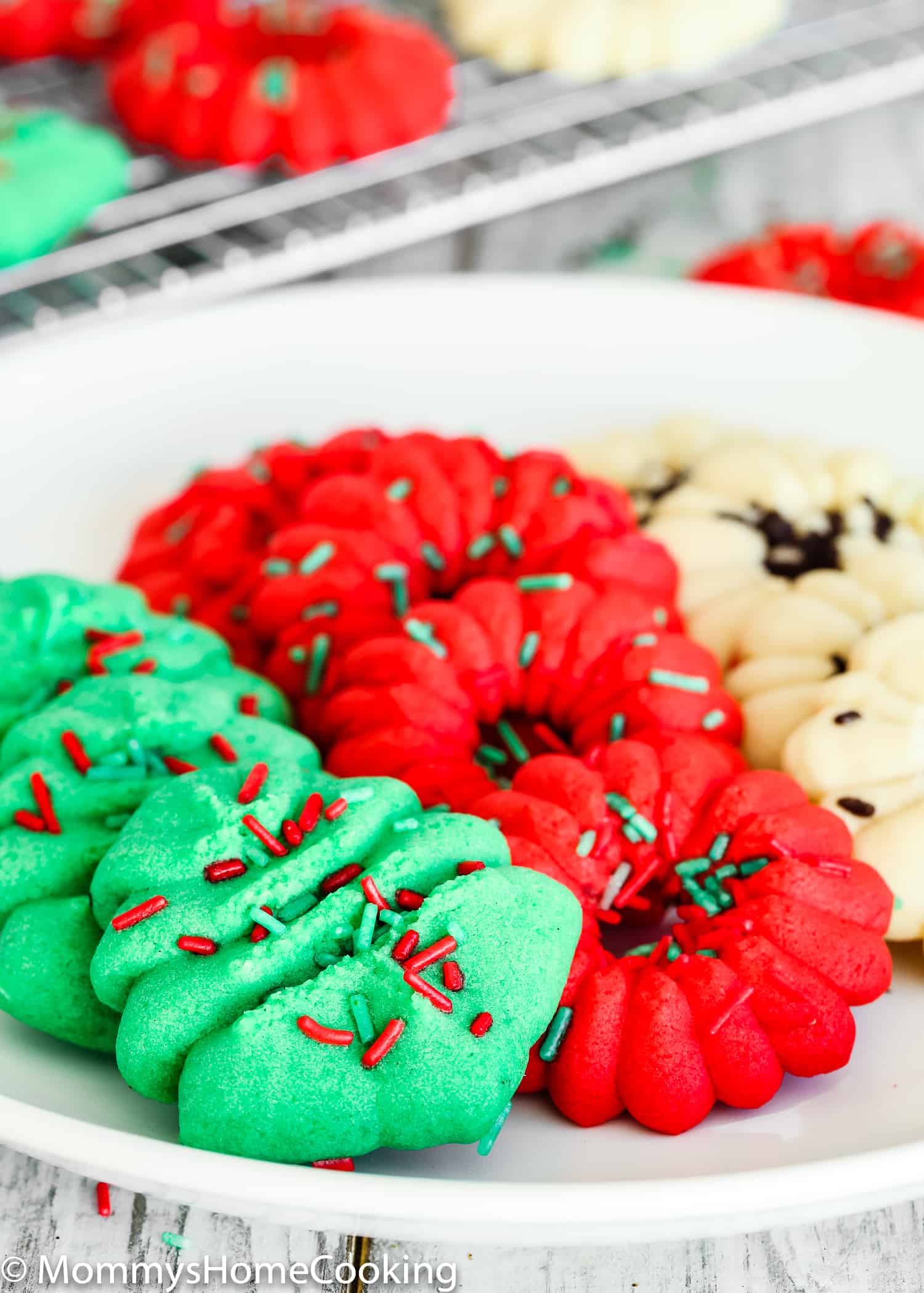 Christmas Eggless Spritz Cookies on a plate. 