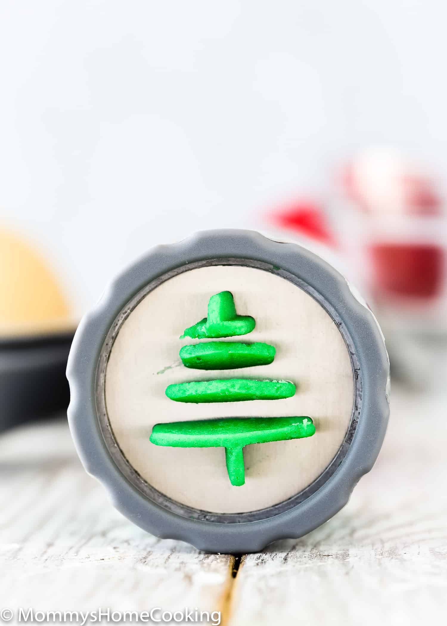 Eggless Spritz Cookies dough in a cookie press. 