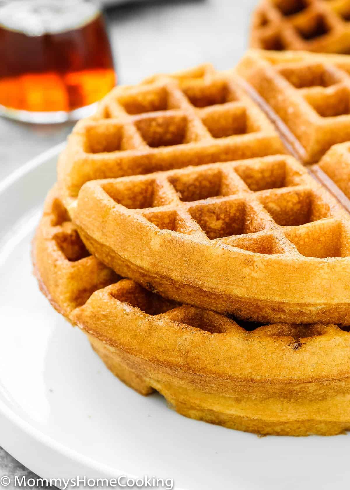 eggless waffles stack on a white plate