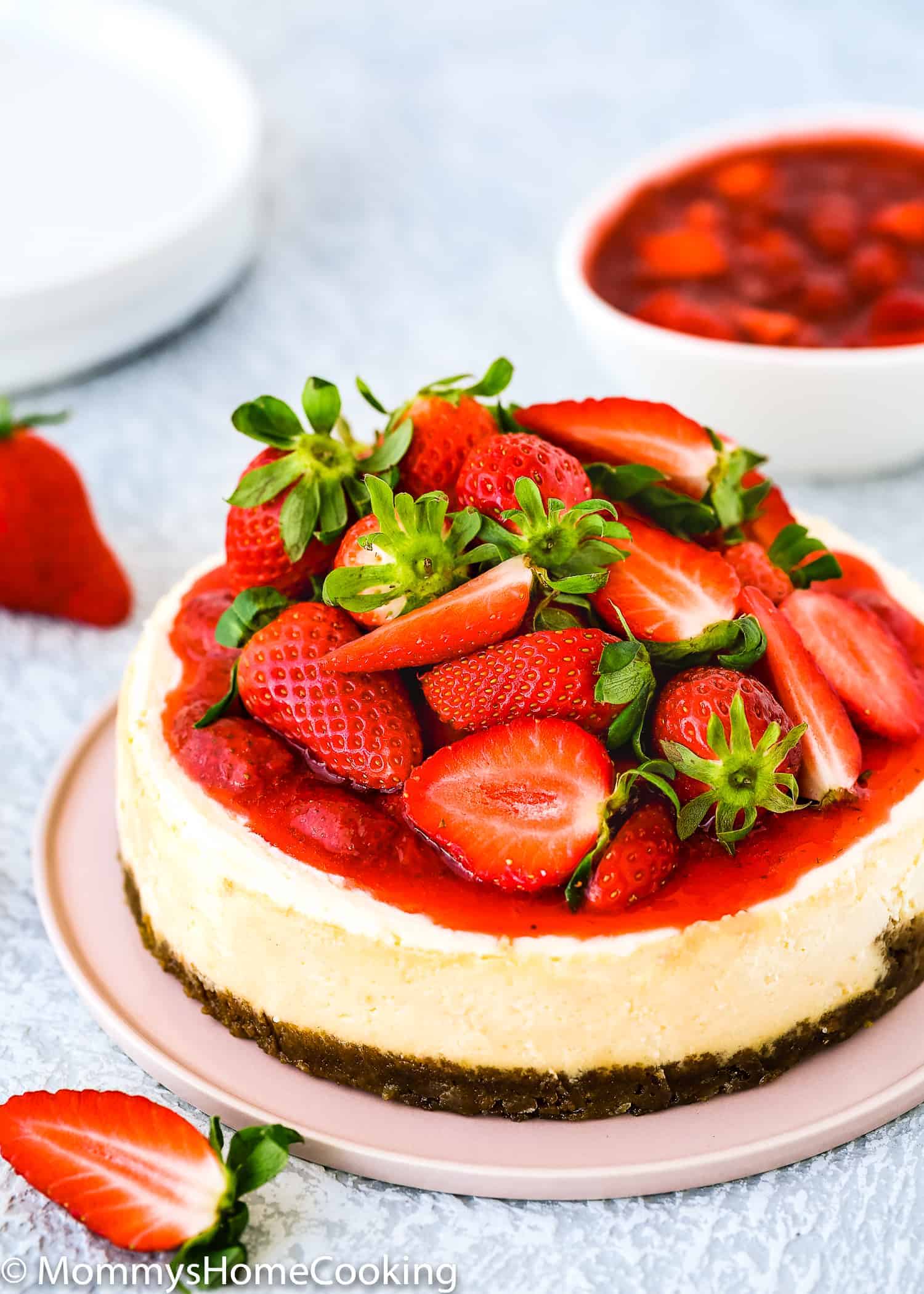 eggless cheesecake made in the instant pot topped with strawberry sauce.