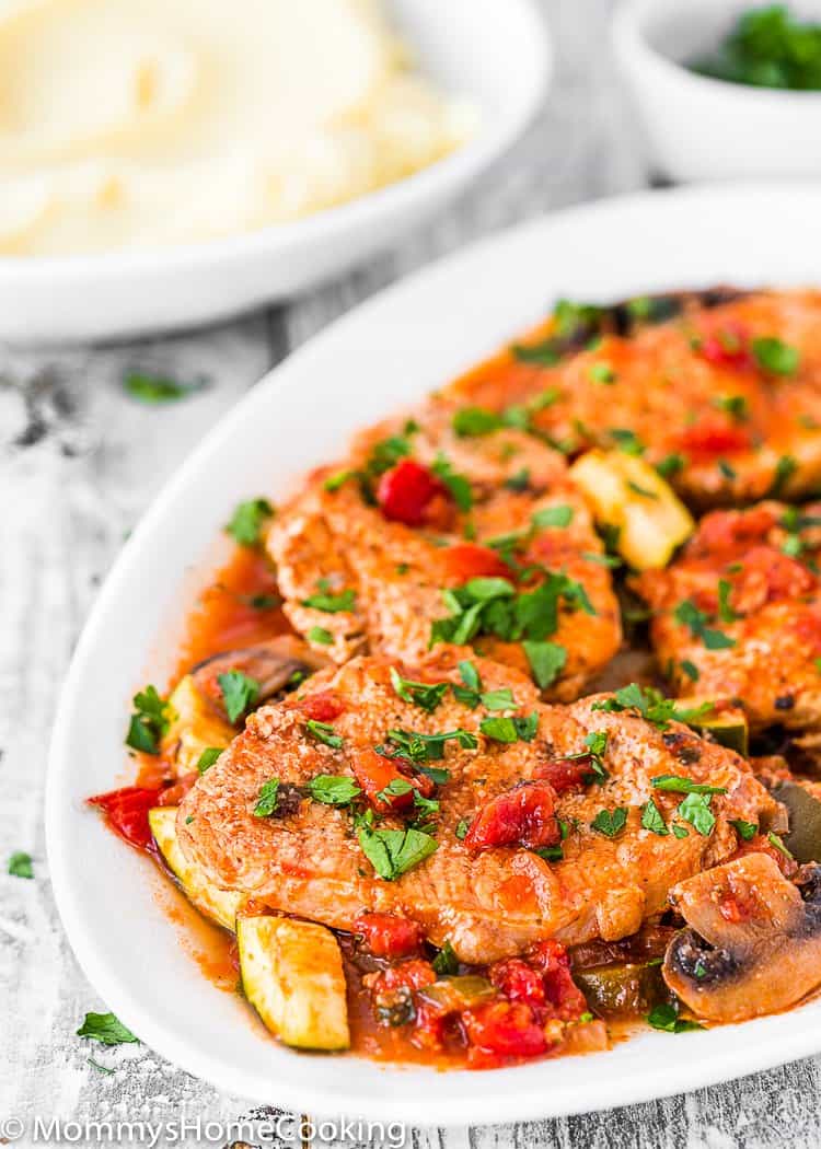 Easy Instant Pot Italian Pork Chops in a serving plate