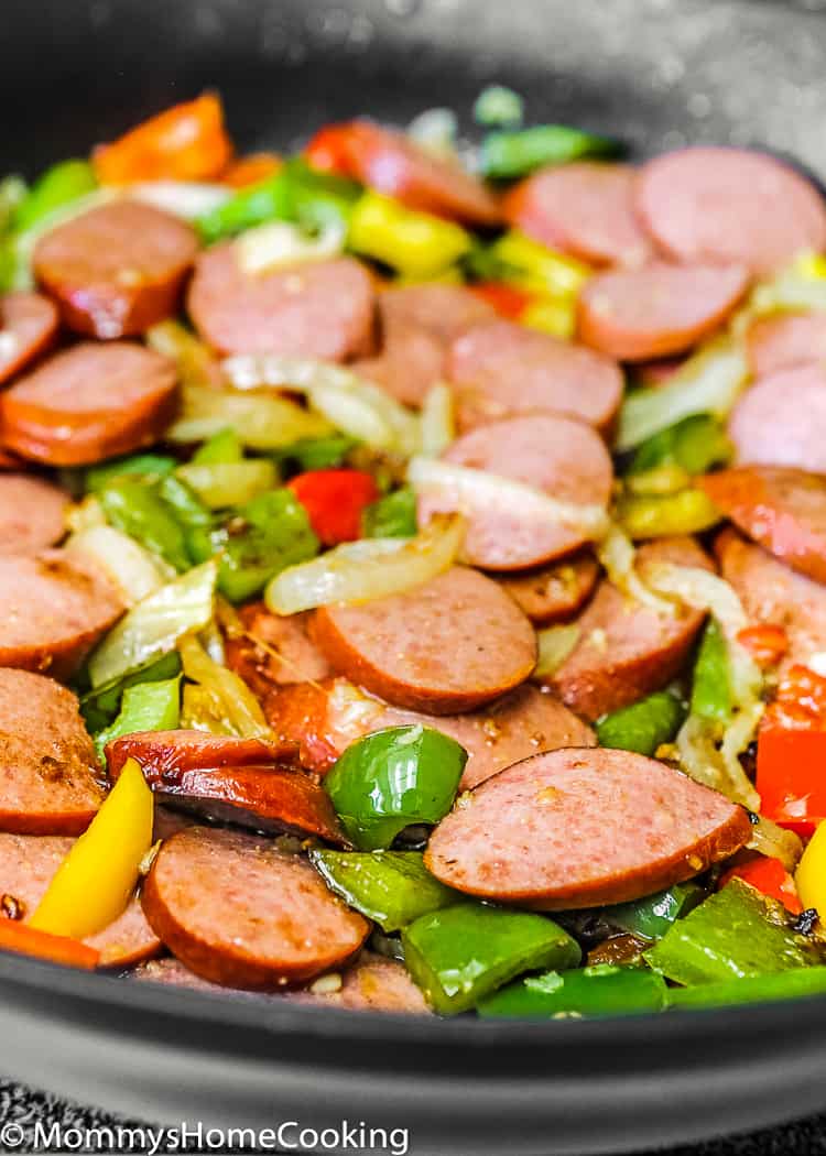 This Easy Sausage and Peppers Rice Skillet is really satisfying and delicious. it’s easy and quick to put together since it’s done in 30 minutes. Perfect for any day of the week! https://mommyshomecooking.com