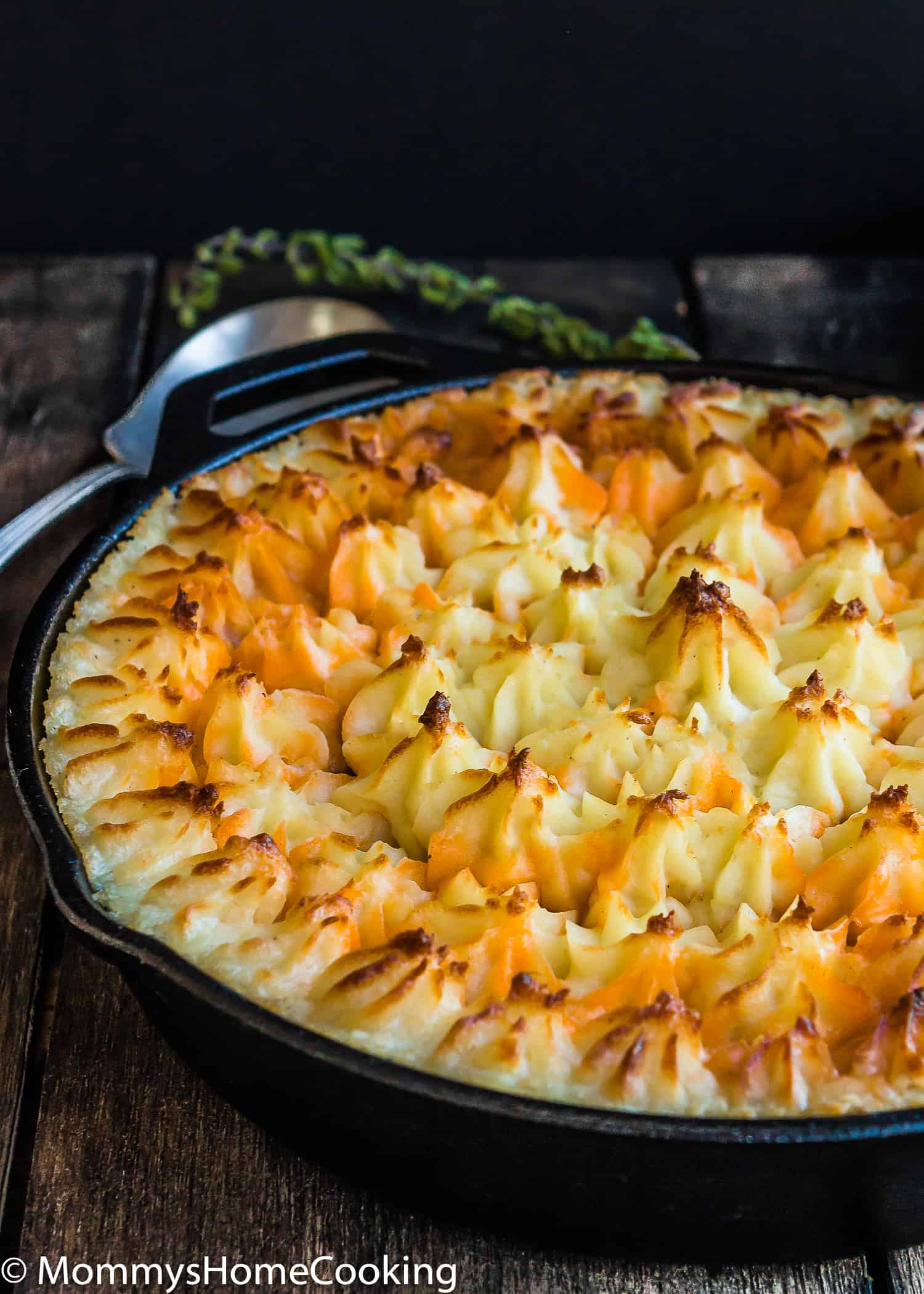 This Easy Shepherd's Pie recipe is a complete, comforting, and scrumptious meal full of flavor! Made from scratch with Parmesan mashed potatoes and baked to perfection. https://mommyshomecooking.com