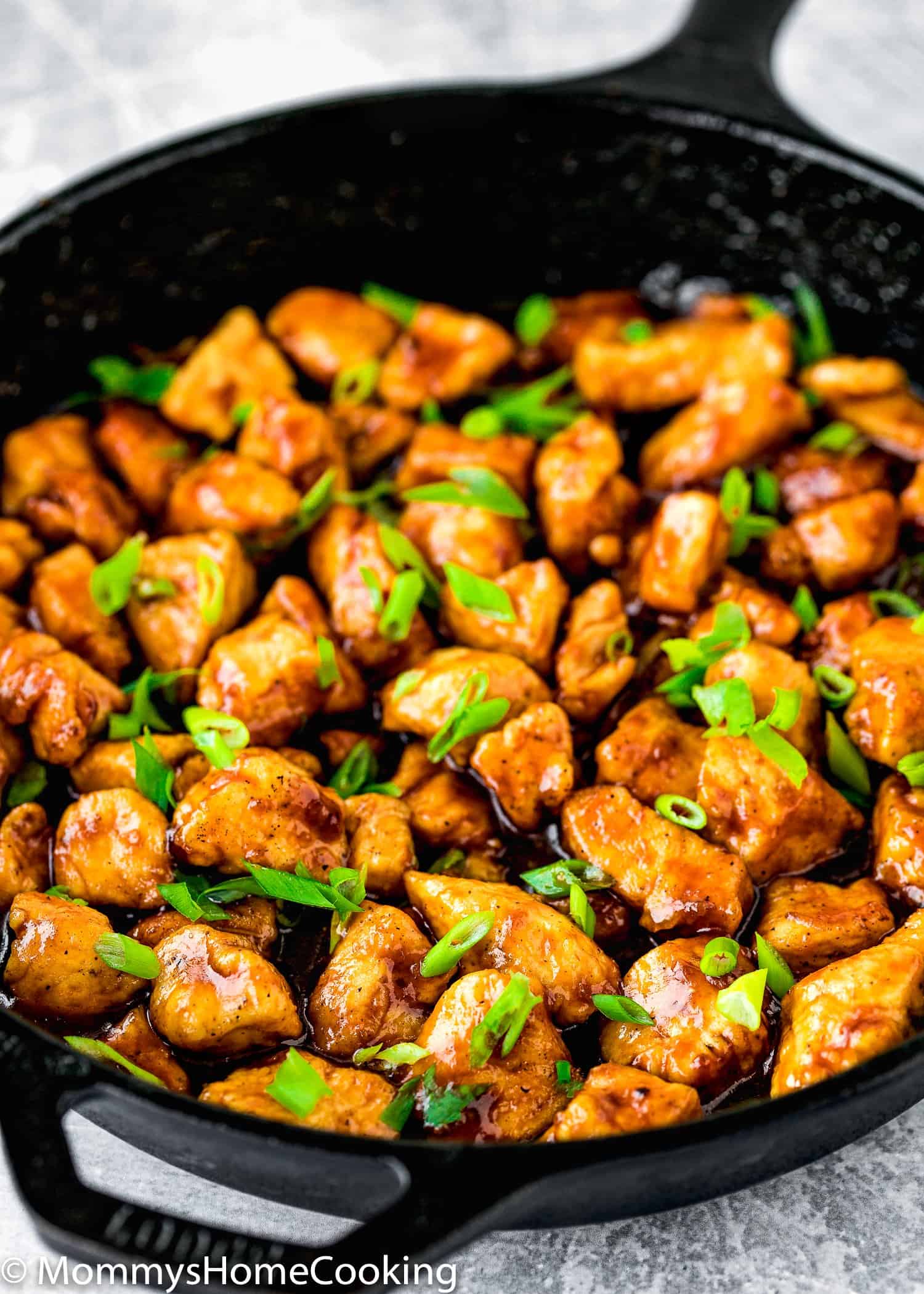 Easy Sticky Bourbon Chicken with sliced green onions