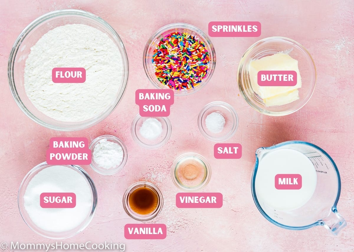 Ingredients needed to make eggless Funfetti cupcakes with name tags. 