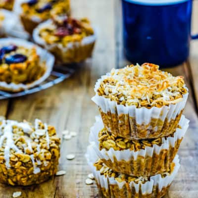 stack of three Eggless Baked Apple Oatmeal Muffins with a cup of coffee on the background