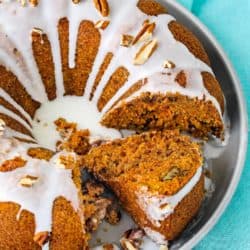 sliced eggless carrot cake on a plate