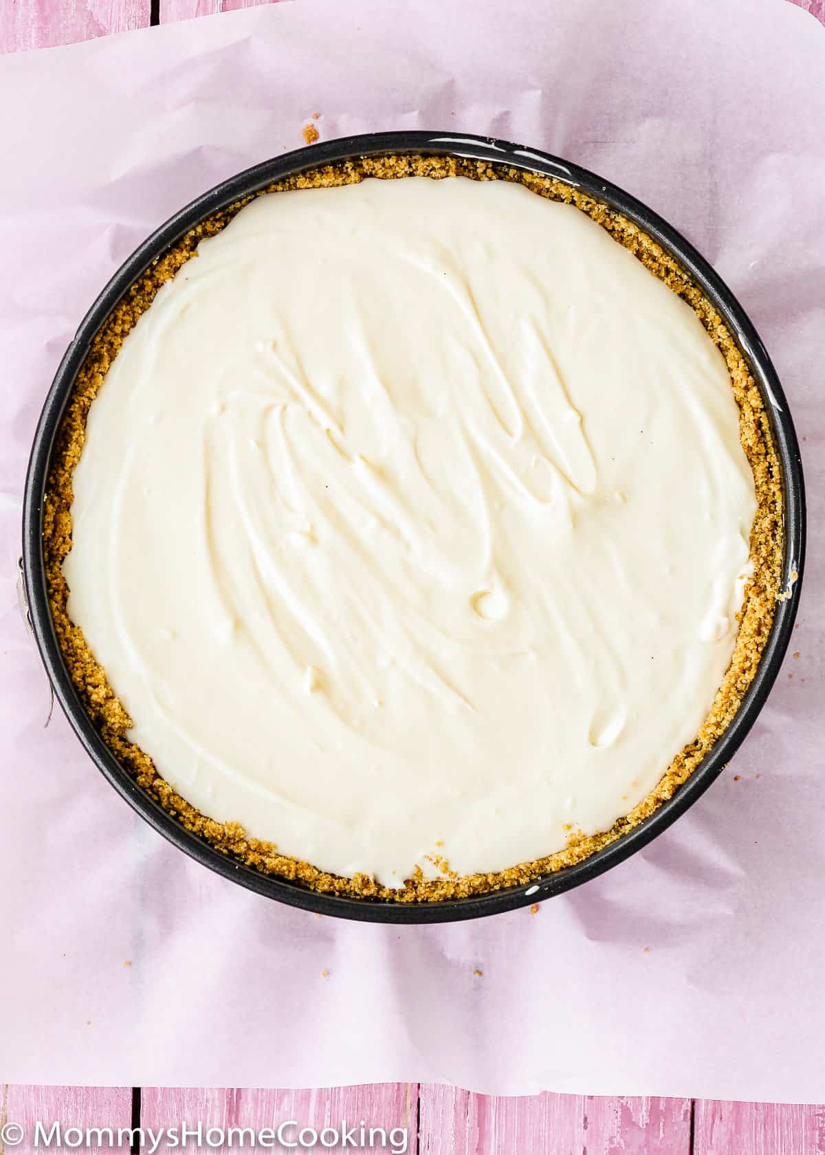 unbaked eggless cheesecake in a springform pan
