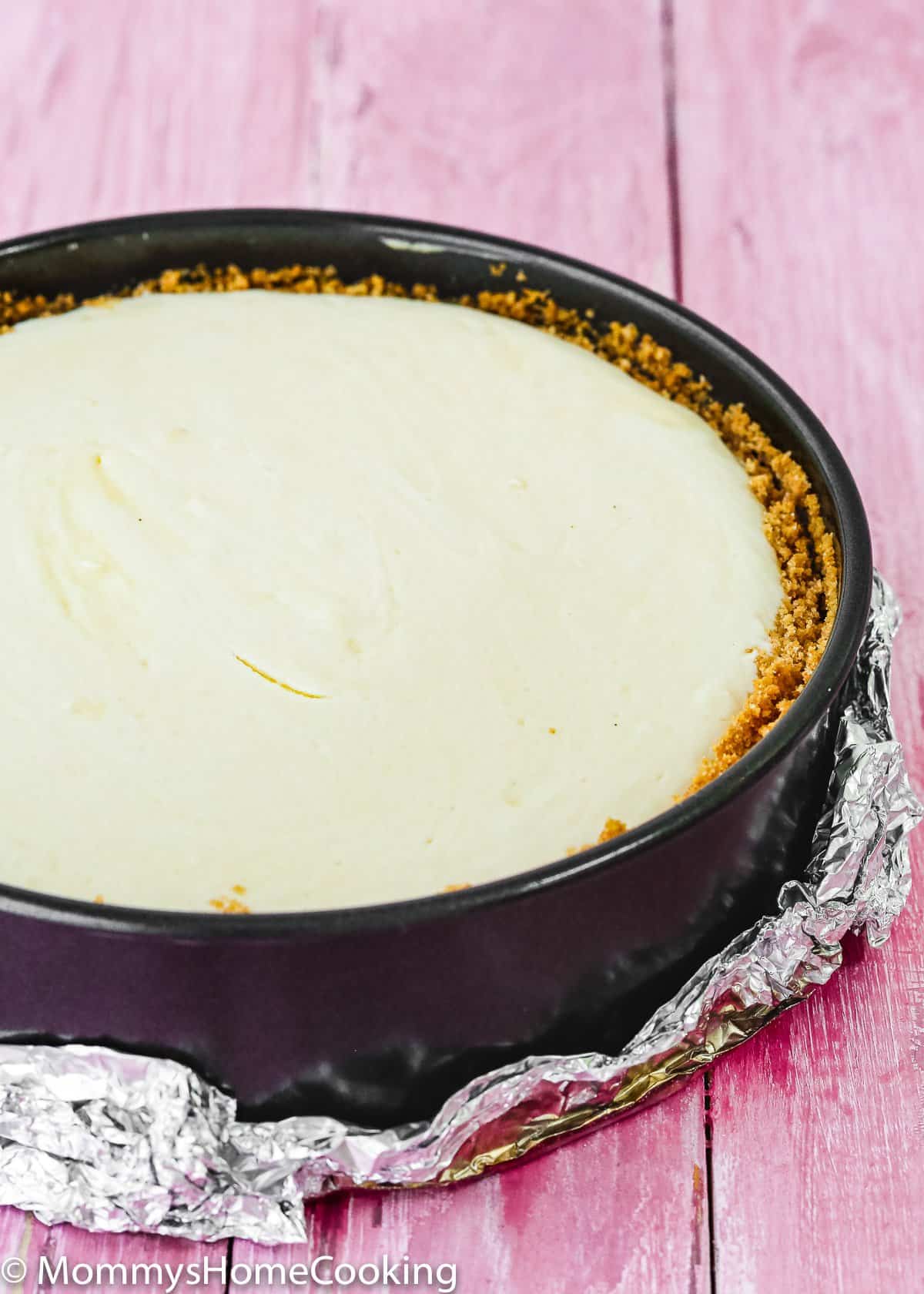 baked eggless cheesecake in a springform pan