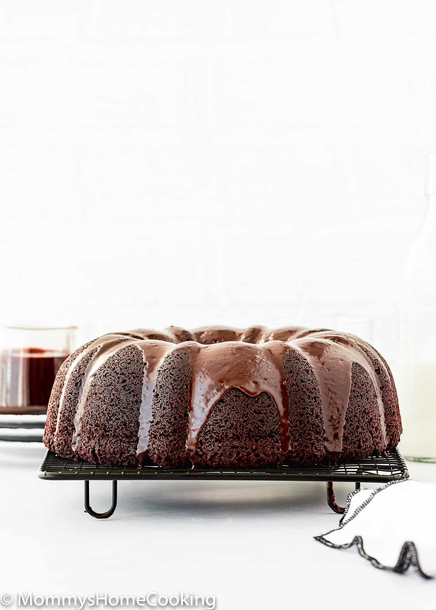 Eggless Chocolate Bundt Cake on a cooling rack.