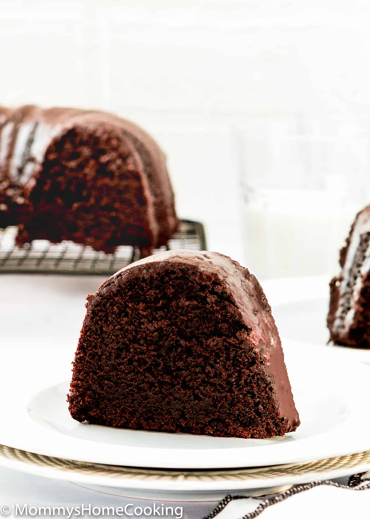 Eggless Chocolate Bundt Cake slice on a plate.