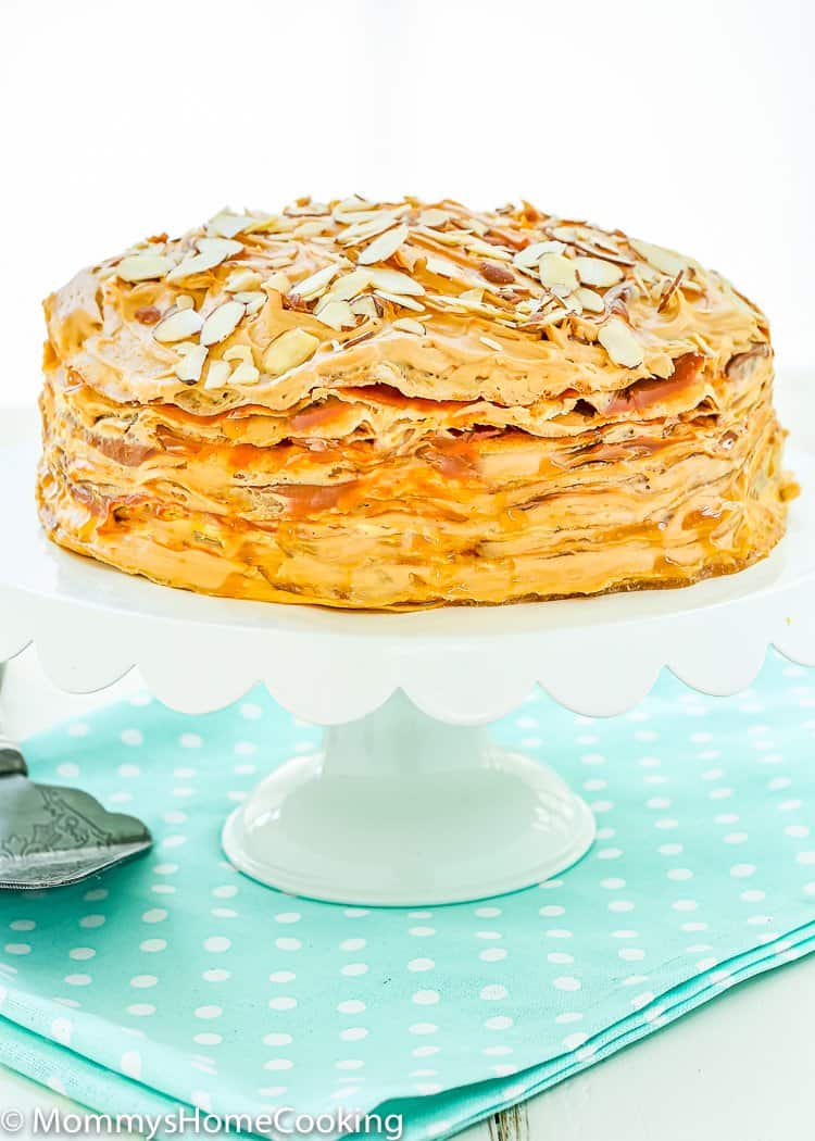 Eggless Dulce de Leche Crepe Cake on a cake stand