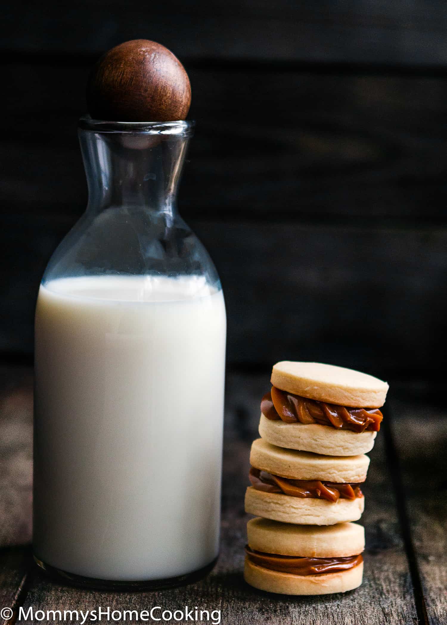 What is better than a cookie? A Sandwich Cookie!! These Eggless Dulce de Leche Shortbread Sandwich Cookies are buttery, rich incredibly tender and delicious. 9 filling ideas included. https://mommyshomecooking.com