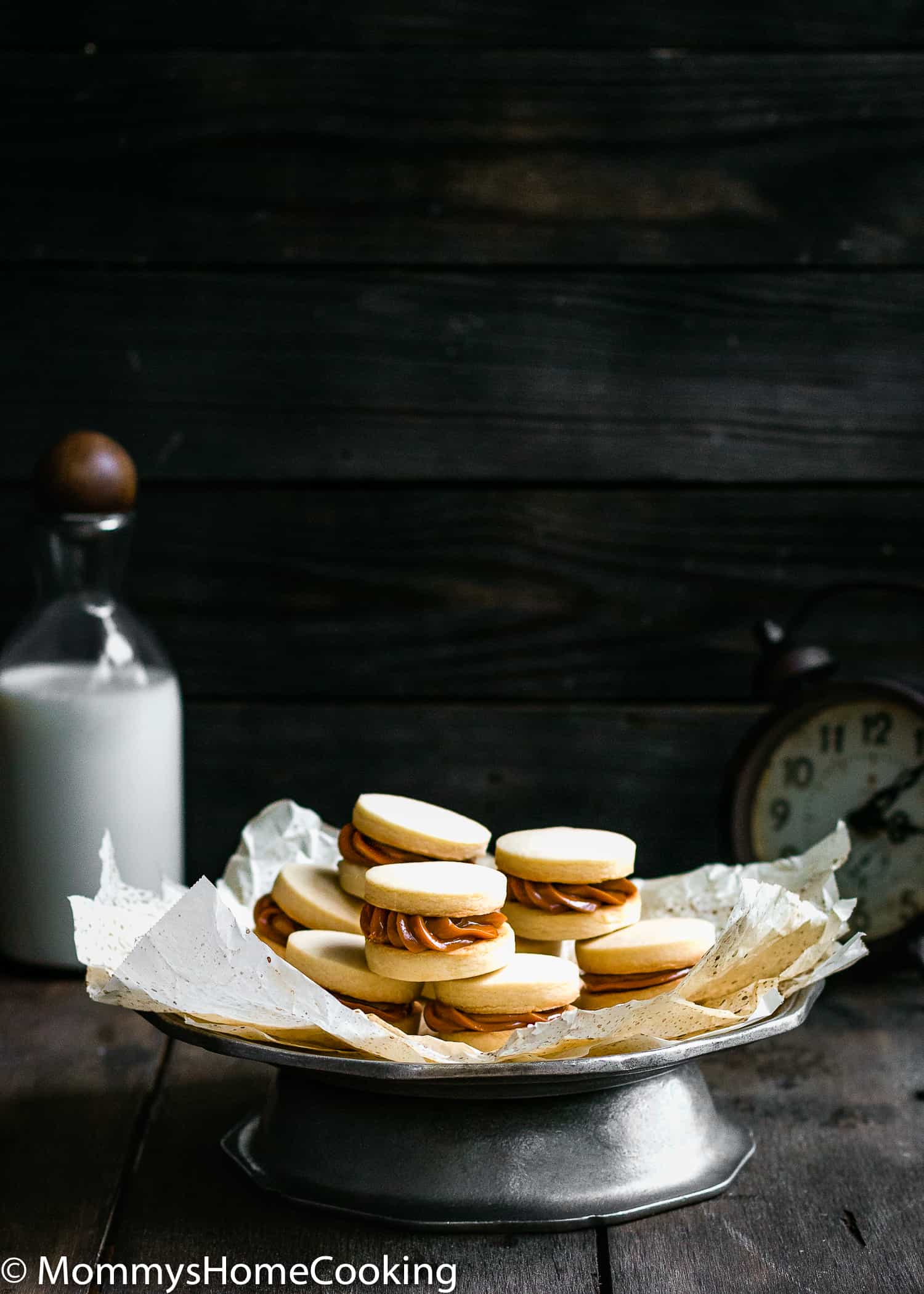 What is better than a cookie? A Sandwich Cookie!! These Eggless Dulce de Leche Shortbread Sandwich Cookies are buttery, rich incredibly tender and delicious. 9 filling ideas included. https://mommyshomecooking.com