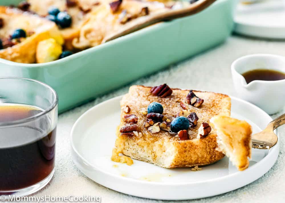 Eggless French Toast in a plate with nuts and blueberries