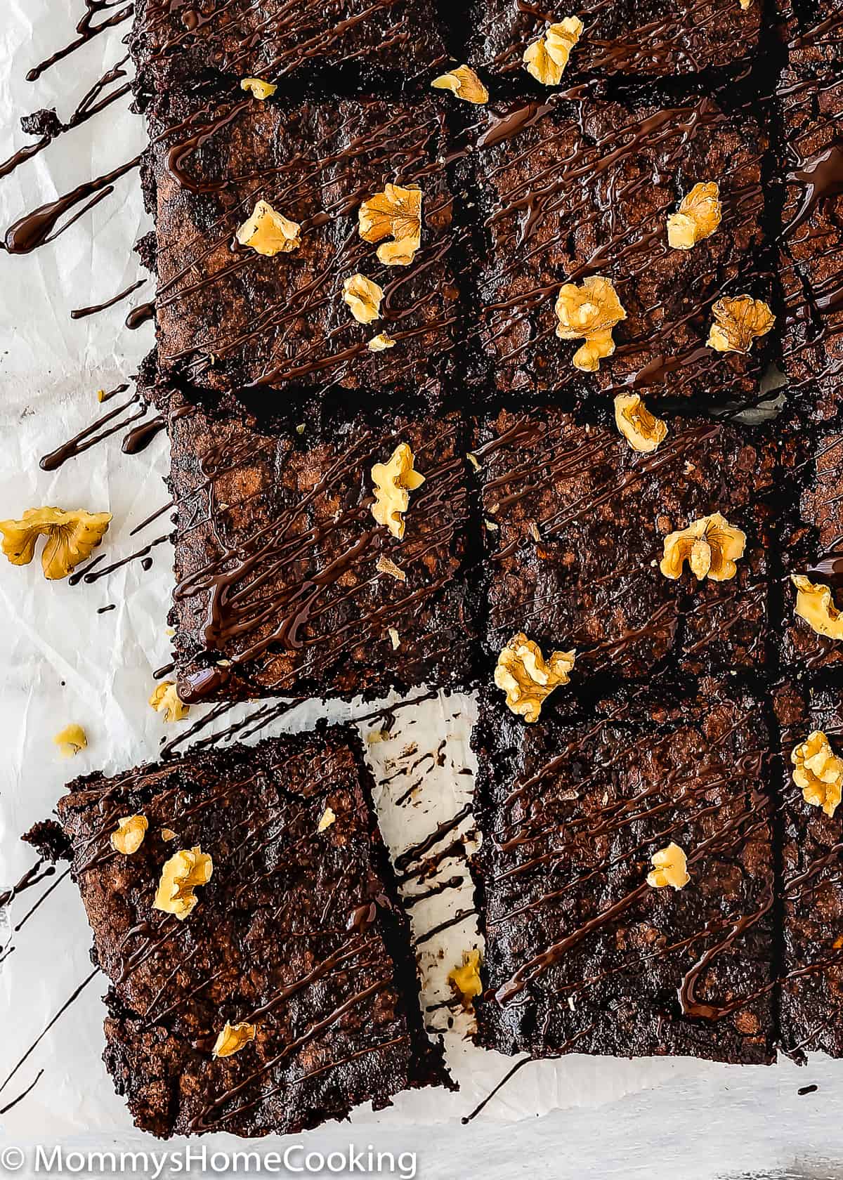 Eggless Fudgy Zucchini Brownies with a drizzle of chocolate and walnuts
