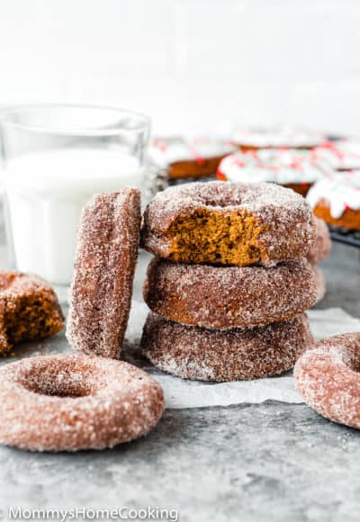 Eggless Gingerbread Donuts stack with a glass of milk