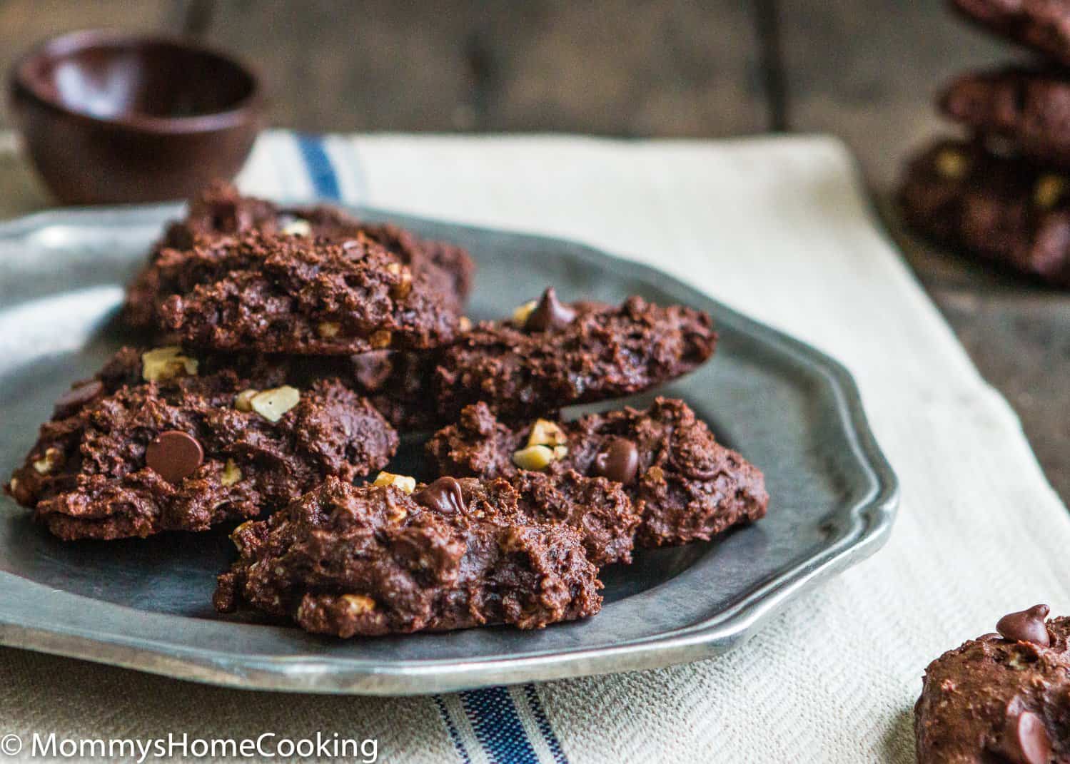 eggless healthy double chocolate chunk walnut cookies on a metal plate
