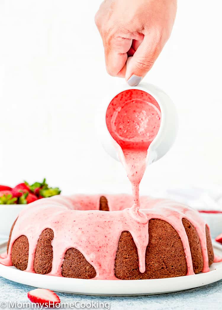 Eggless Homemade Strawberry Bundt Cake with strawberry glaze in a serving plate