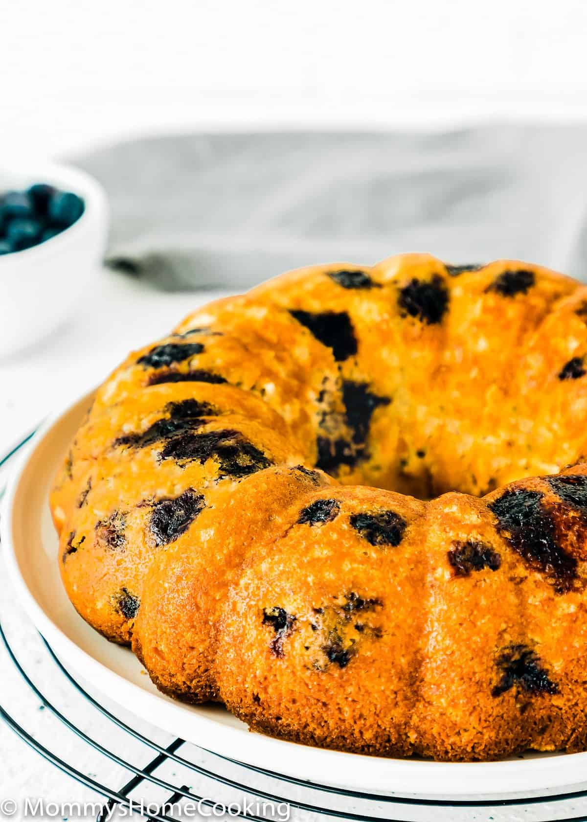 Eggless Lemon Blueberry bundt Cake on a plate