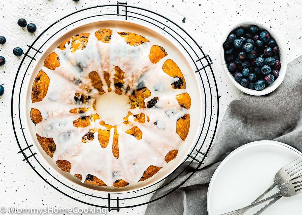 overhead view of a Eggless Lemon Blueberry bundt Cake on a plate