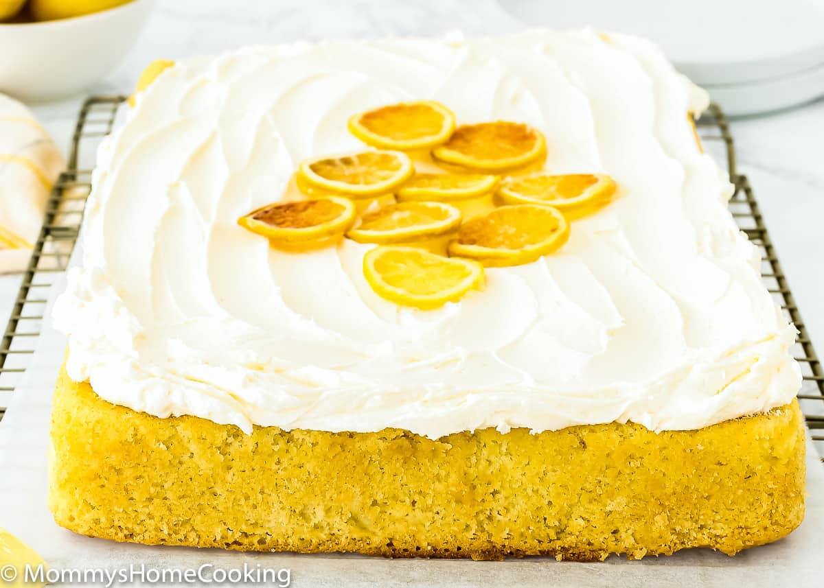 Sheet pan Eggless Lemon Cake with frosting.