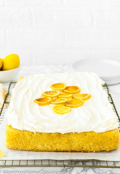 Eggless Lemon Cake with lemon butter cream on a cooling rack