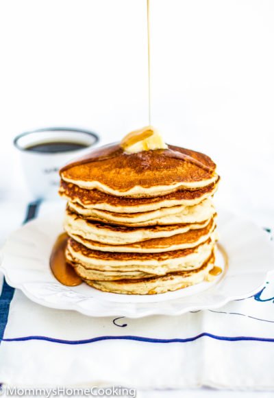 Eggless Pancakes stack with butter and syrup