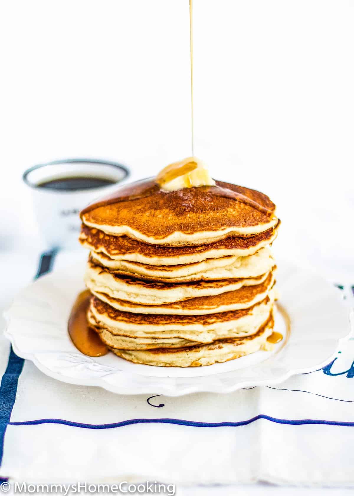 Eggless Pancakes stack with butter and syrup