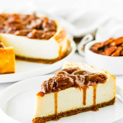 Eggless Pecan Pie Cheesecake slice on a white plate