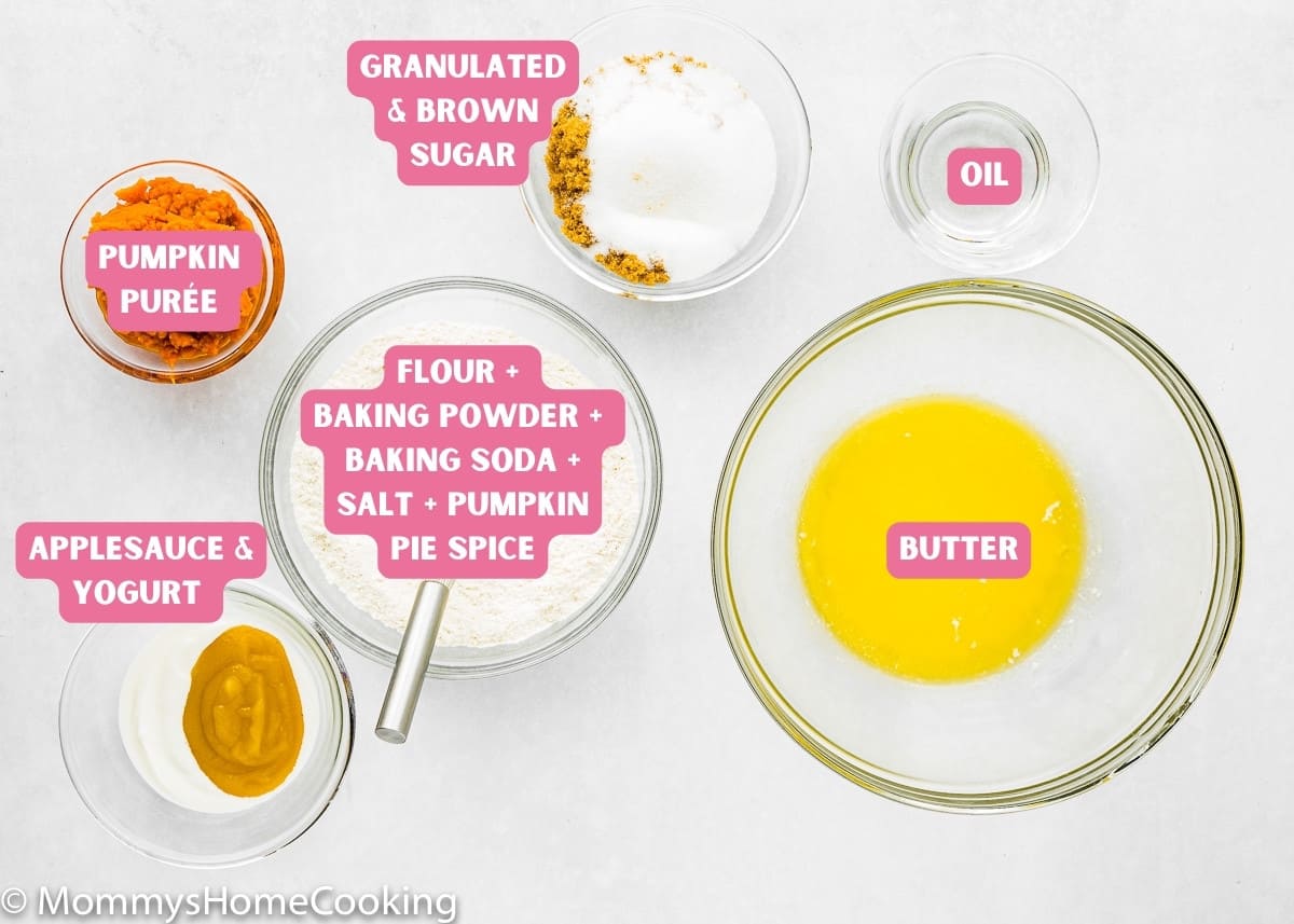 Ingredients needed to make Eggless Pumpkin Bread ingredients over a white surface with name tags.