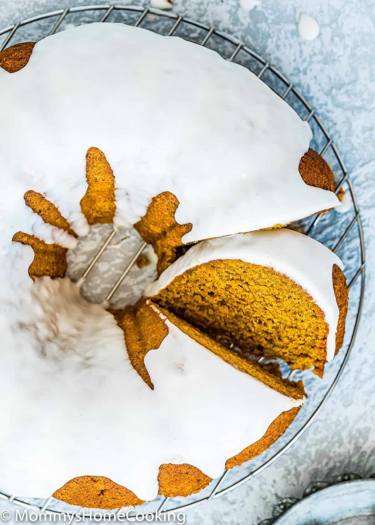 closeup overhead view of a sliced Eggless Pumpkin Cake.