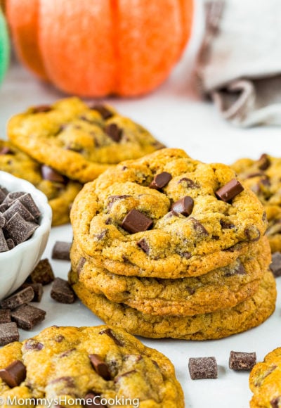 Eggless Pumpkin Chocolate Chip Cookies stack over a white surface
