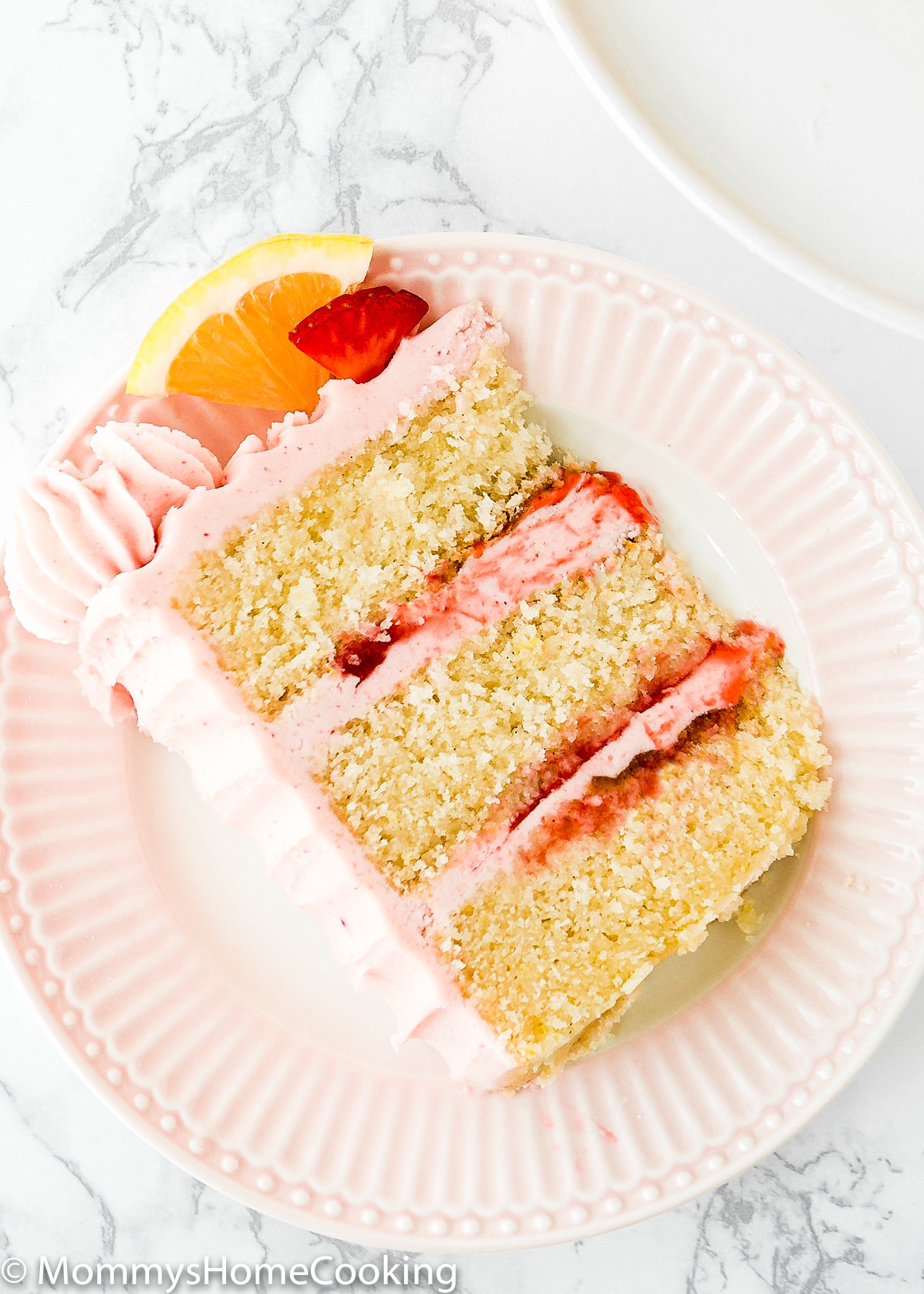 overhead view of a slice of Eggless Strawberry Lemonade Cake.